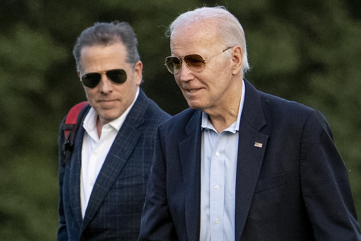 President Joe Biden, and his son Hunter Biden arrive at Fort McNair, Sunday, June 25, 2023, in Washington. Hunter Biden has been charged with felony gun possession. A federal indictment filed in Delaware says Biden lied about his drug use when he bought a firearm in 2018 while struggling with addiction to crack cocaine. (AP Photo/Andrew Harnik, File)