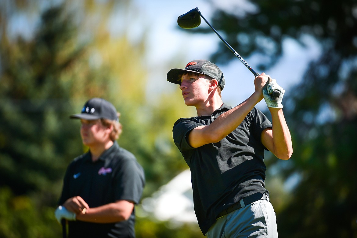 Flathead's Korbin Eaton watches his drive on the eleventh tee during the Kalispell Invite at Buffalo Hill Golf Club on Thursday, Sept. 14. (Casey Kreider/Daily Inter Lake)