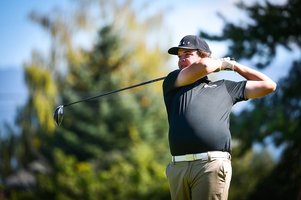 Flathead's Dylan Morris watches his drive on the eleventh tee during the Kalispell Invite at Buffalo Hill Golf Club on Thursday, Sept. 14. (Casey Kreider/Daily Inter Lake)