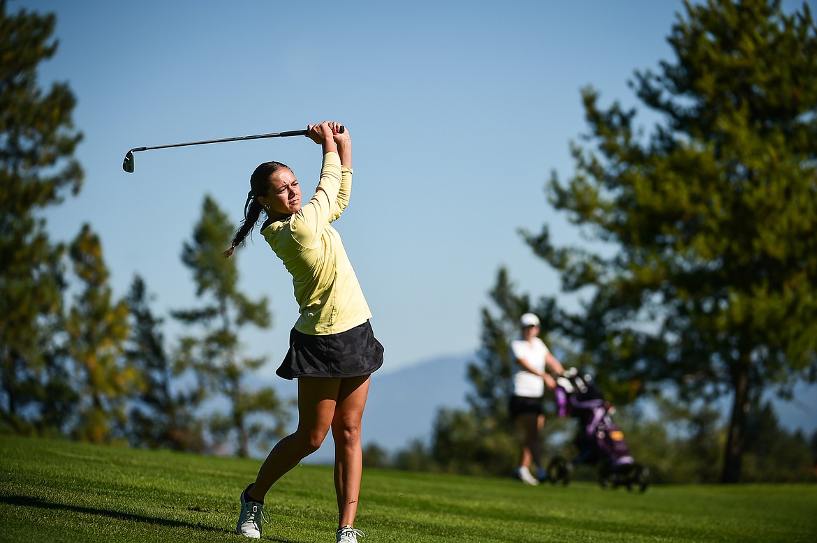 Glacier's Chloe Tanner watches her approach on the second fairway during the Kalispell Invite at Buffalo Hill Golf Club on Thursday, Sept. 14. (Casey Kreider/Daily Inter Lake)