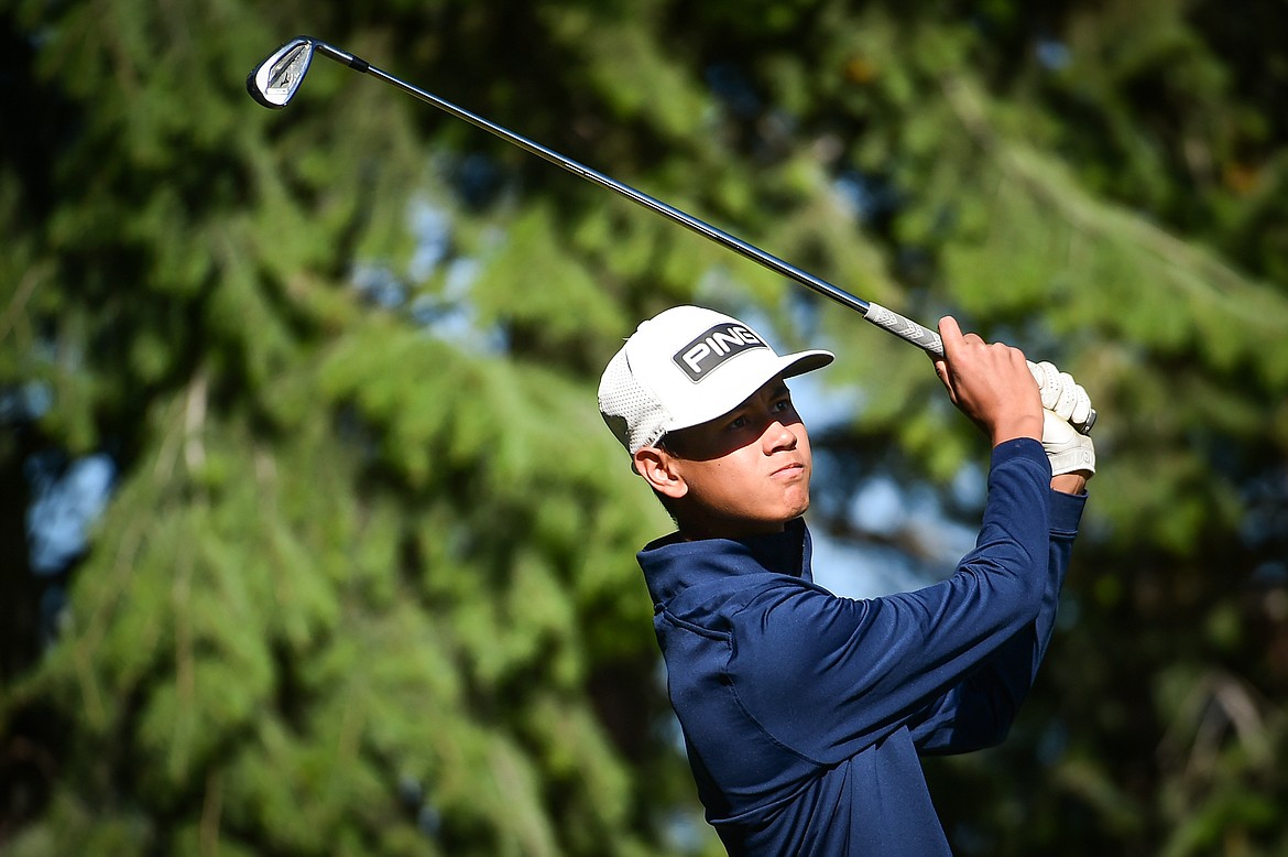 Glacier's Trevor Cunningham watches his tee shot on the fourth hole during the Kalispell Invite at Buffalo Hill Golf Club on Thursday, Sept. 14. (Casey Kreider/Daily Inter Lake)