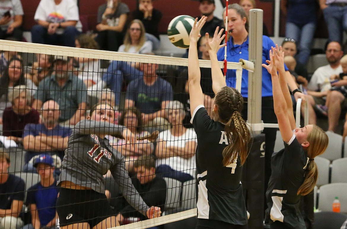 Almira/Coulee-Hartline senior Natalie Evers records a block against Waterville-Mansfield.