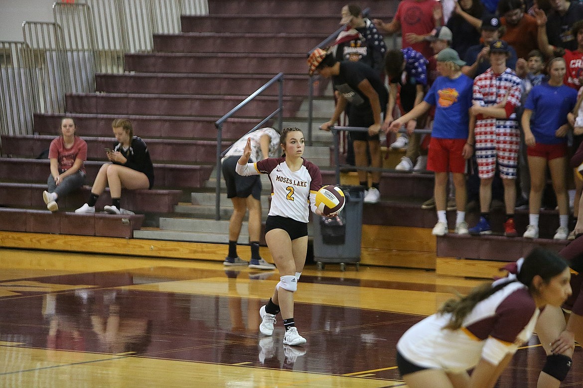 Moses Lake senior Raegen Hofheins (2) gets ready to serve the ball in a game against Davis last year.