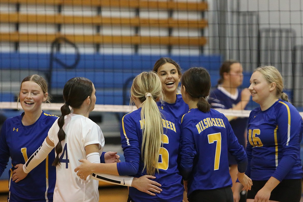 Wilson Creek players celebrate after scoring a point.