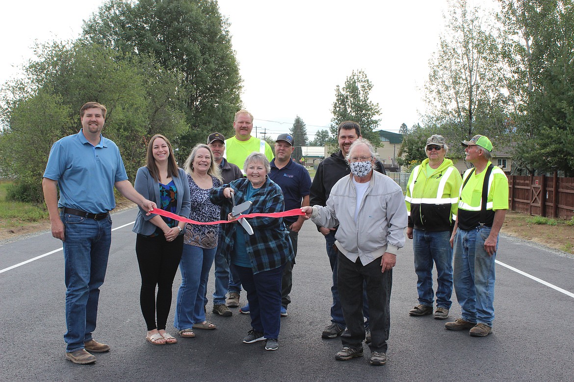 Kootenai officials are pictured in a 2021 ribbon-cutting celebrating the opening of a new second of Second Street. Kootenai Mayor Nancy Lewis spoke Thursday at the Greater Sandpoint Chamber of Commerce's "State of the Cities" event about improvements and upgrades to the street and a nearby walking path.