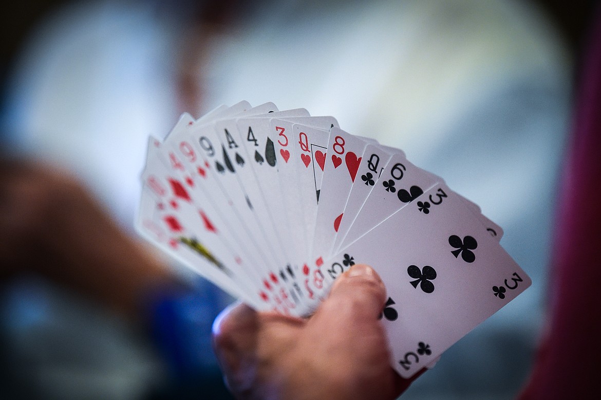 Players play a game of bridge at the Flathead Valley Bridge Center in Kalispell on Friday, Sept. 15. (Casey Kreider/Daily Inter Lake)