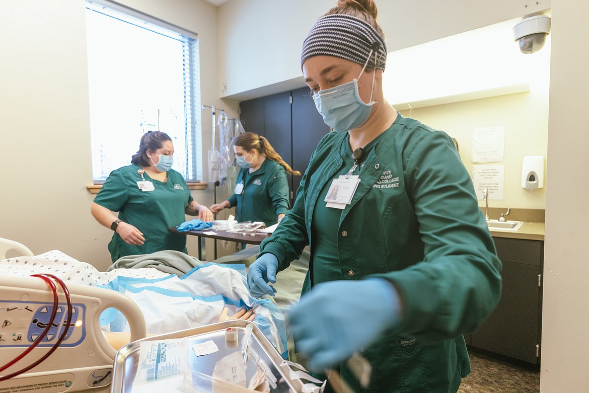 North Idaho Practical Nursing student Kayla Configliacco, from Coeur d’Alene, makes use of her health care skills in a nursing lab at NIC recently. Health Professions and Nursing is just one of seven areas that will benefit in new equipment from a one-time state grant.