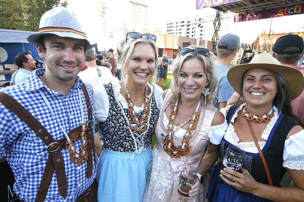 Family and friends enjoy Oktoberfest in Coeur d'Alene on Friday. Dressed for the occasion are, from left, Bryan Lehrman, Holly Lehrman, Shelley Lehrman and Amber Sorsenson.