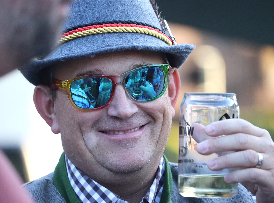 Joel Laker makes a toast during the opening of Oktoberfest in Coeur d'Alene on Friday.