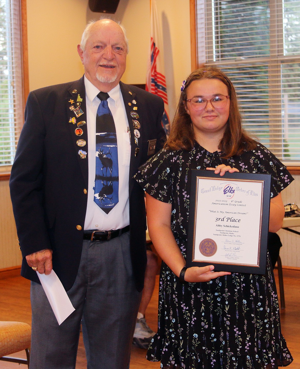 Bob Huyck, Elks Exalted Ruler for 2023, presents Abbey Schickendanz, right, with a certificate to honor the Sandpoint Christian School student for winning third place in her age division in the Elks national essay contest.