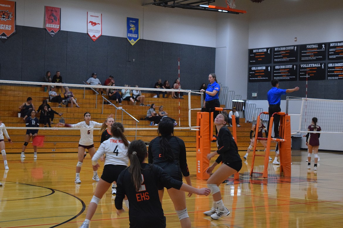 Tiger volleyball players scramble to cover an incoming ball during Saturday's volleyball tournament. Final results of the tourney that included multiple teams from the Basin and elsewhere in Washington weren't available by press time. Additional coverage will be provided once results are available.