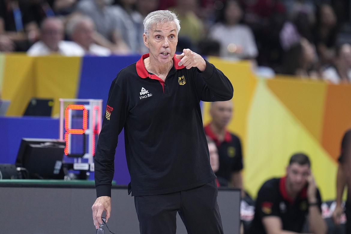 MICHAEL CONROY/Associated Press
Germany coach Gordie Herbert directs his team during the championship game of the Basketball World Cup against Serbia in Manila, Philippines, on Sept. 10.