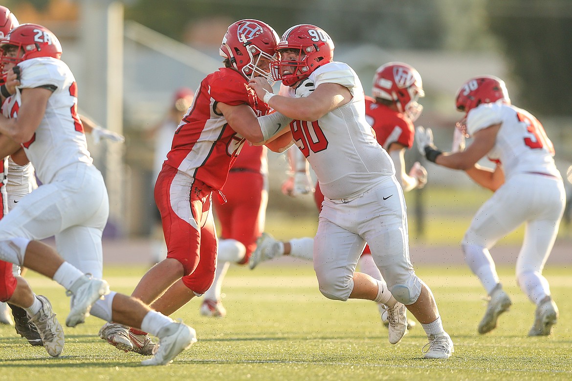 Sandpoint's Tyson Hodges battles hard on the defensive line Saturday. Hodges has recorded a sack or a tackle for loss in all four games this season for the Bulldogs.