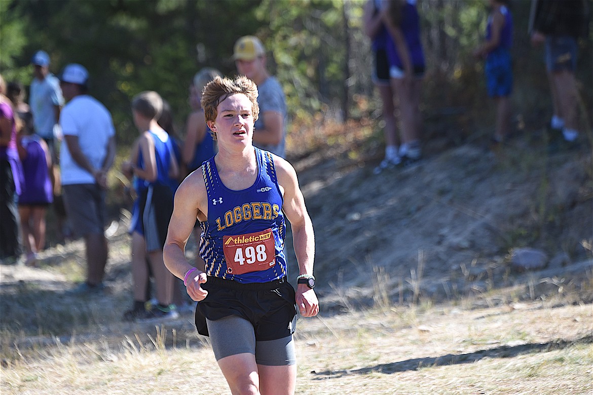 Libby cross country runner Rowen Sherbo comes to the finish line at the Libby Wilderness Run on Saturday, Sept. 16, at the Flower Creek Cross Country Ski Area. (Scott Shindledecker/The Western News)