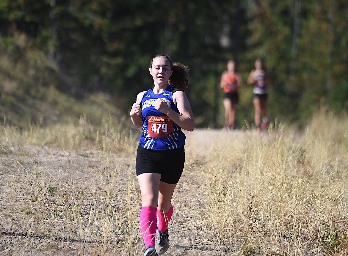 Libby cross country runner Annika Benner comepetes in the Libby Wilderness Run on Saturday, Sept. 16, at the Flower Creek Cross Country Ski Area. (Scott Shindledecker/The Western News)