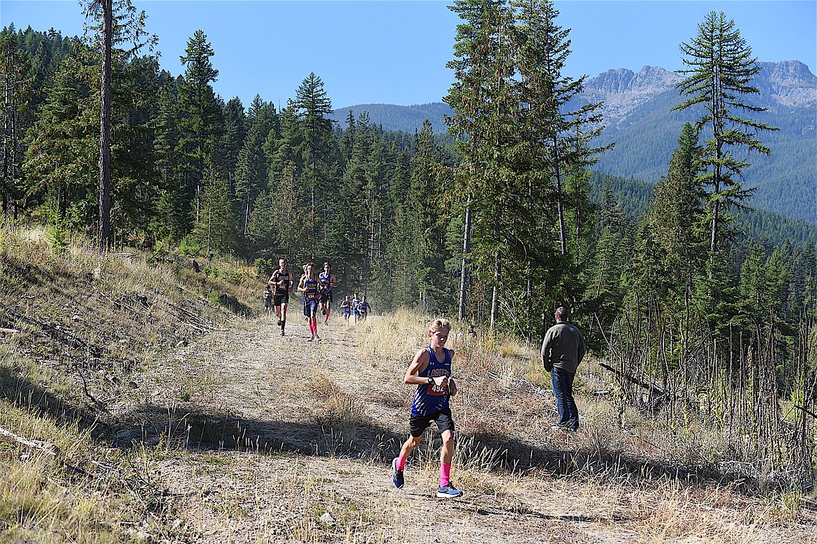 The Cabinet Mountains provide a scenic backdrop at the Libby Wilderness Run on Saturday, Sept. 16, at the Flower Creek Cross Country Ski Area. (Scott Shindledecker/The Western News)