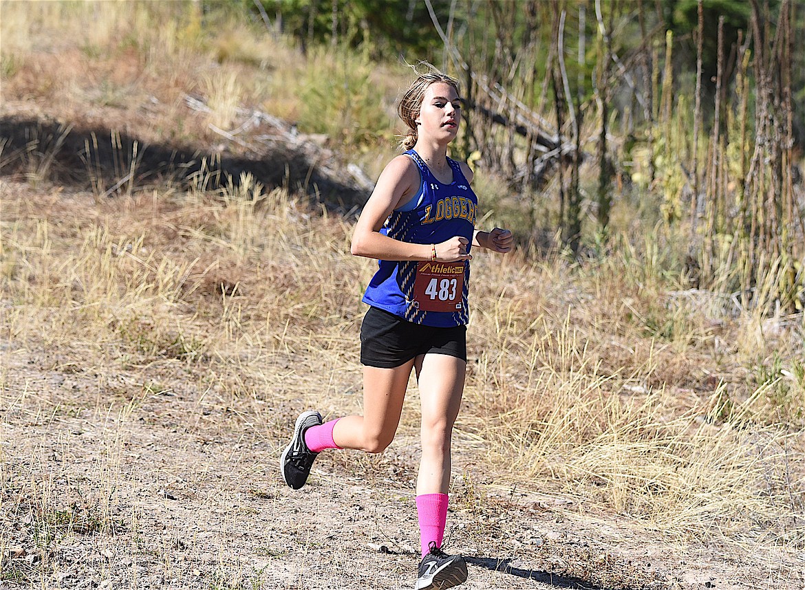 Libby cross country runner Carmen Kohler competes in the finish line at the Libby Wilderness Run on Saturday, Sept. 16, at the Flower Creek Cross Country Ski Area. (Scott Shindledecker/The Western News)