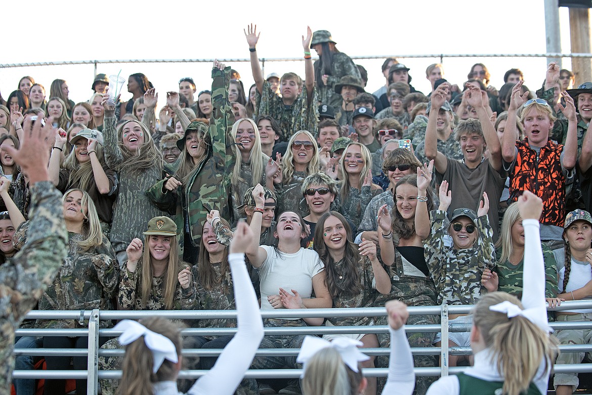 The Whitefish Bulldogs cheerleaders hype up the student section at the Dog Pound on Friday, Sept. 15 in a game against the Columbia Falls Wildcats. The Bulldogs won in overtime, 20-14.