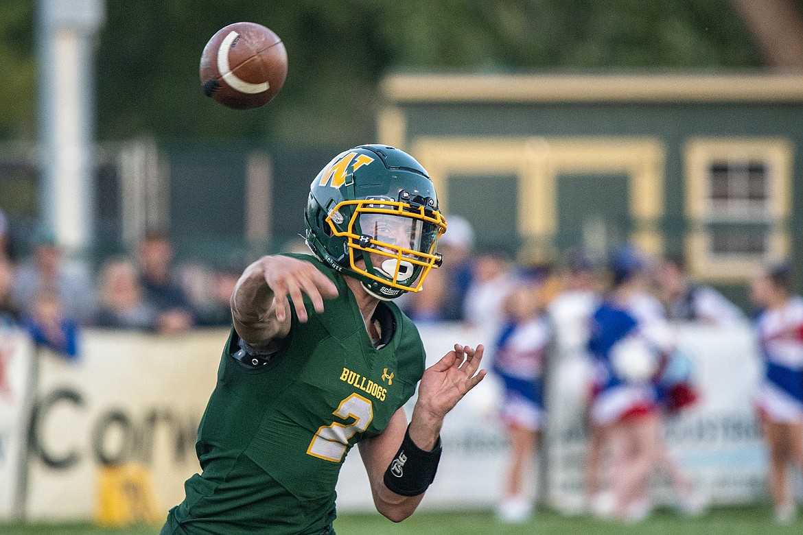 Whitefish quarterback Carson Gulick makes a pass against Columbia Falls at the Dog Pound on Friday, Sept. 15. (Avery Howe/Hungry Horse News)