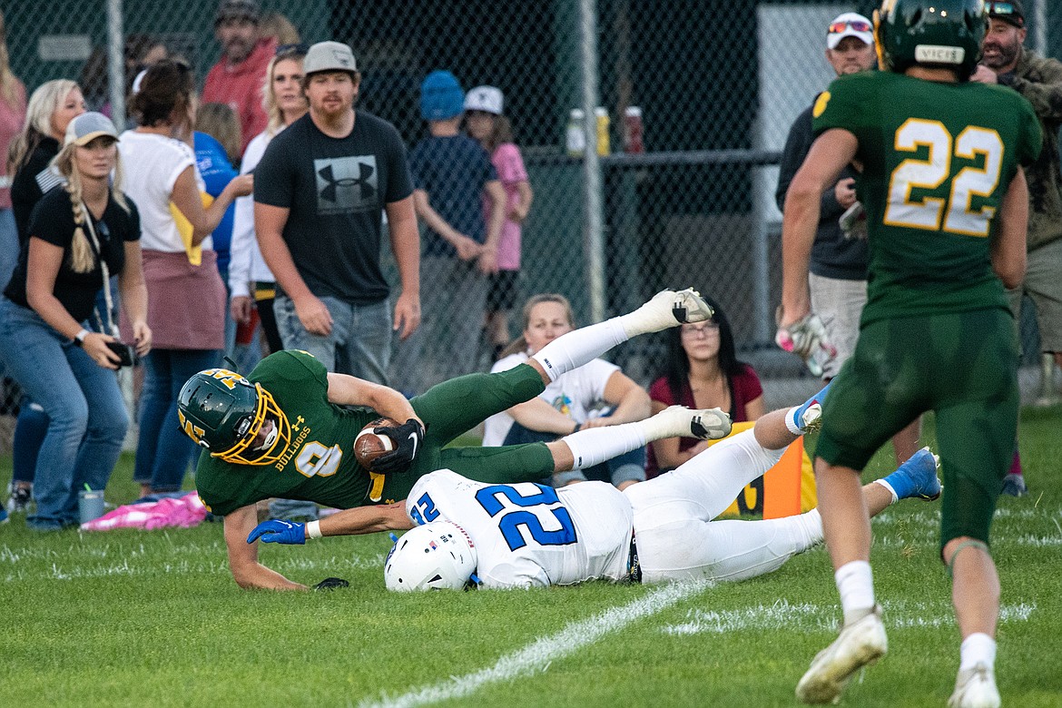 Bulldog receiver C.J. Thew lands in the end zone in a game versus the Columbia Falls at the Dog Pound on Friday, Sept. 15. The Bulldogs won in overtime, 20-14. (Avery Howe/Hungry Horse News)