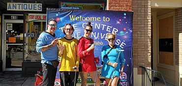 A team competing in the putt-putt tournament set phasers to stun in Wallace at the rededication of the "Center of the Universe" on Sept. 16.