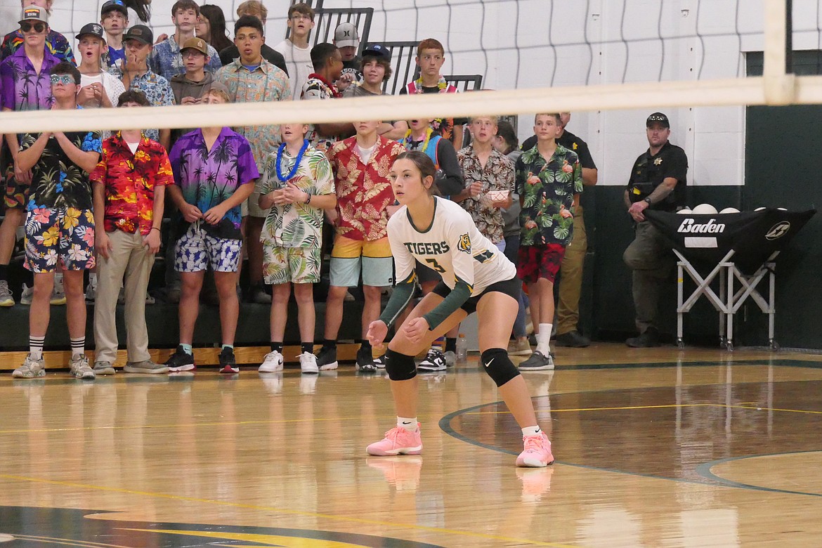 Lady Tigers sophomore Lilly Sansom readies for an incoming serve during St. Regis' match with Charlo Thursday night in St. Regis. (Chuck Bandel/MI-VP)