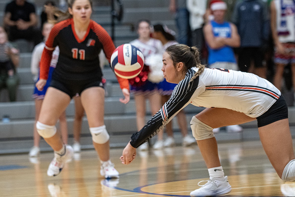 Maiden Kaydance Santos makes a dig against the Columbia Falls Wildkats on the road Friday, Sept. 15. The Wildkats won in three sets. (Avery Howe/Hungry Horse News)