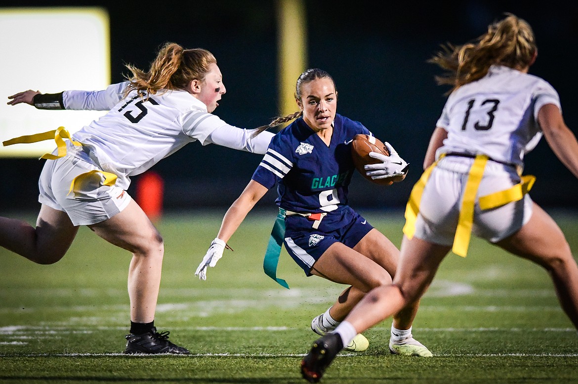 Glacier's Khirsten Terrell (9) looks for running room against Flathead in the second half at Legends Stadium on Tuesday, Sept. 19. (Casey Kreider/Daily Inter Lake)