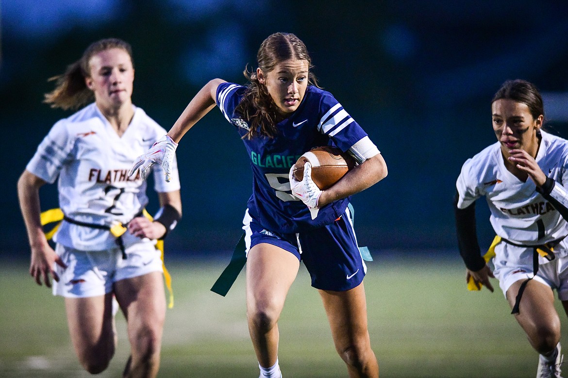 Glacier's Zoey Allen (5) picks up yardage on a long reception in the second half against Flathead at Legends Stadium on Tuesday, Sept. 19. (Casey Kreider/Daily Inter Lake)