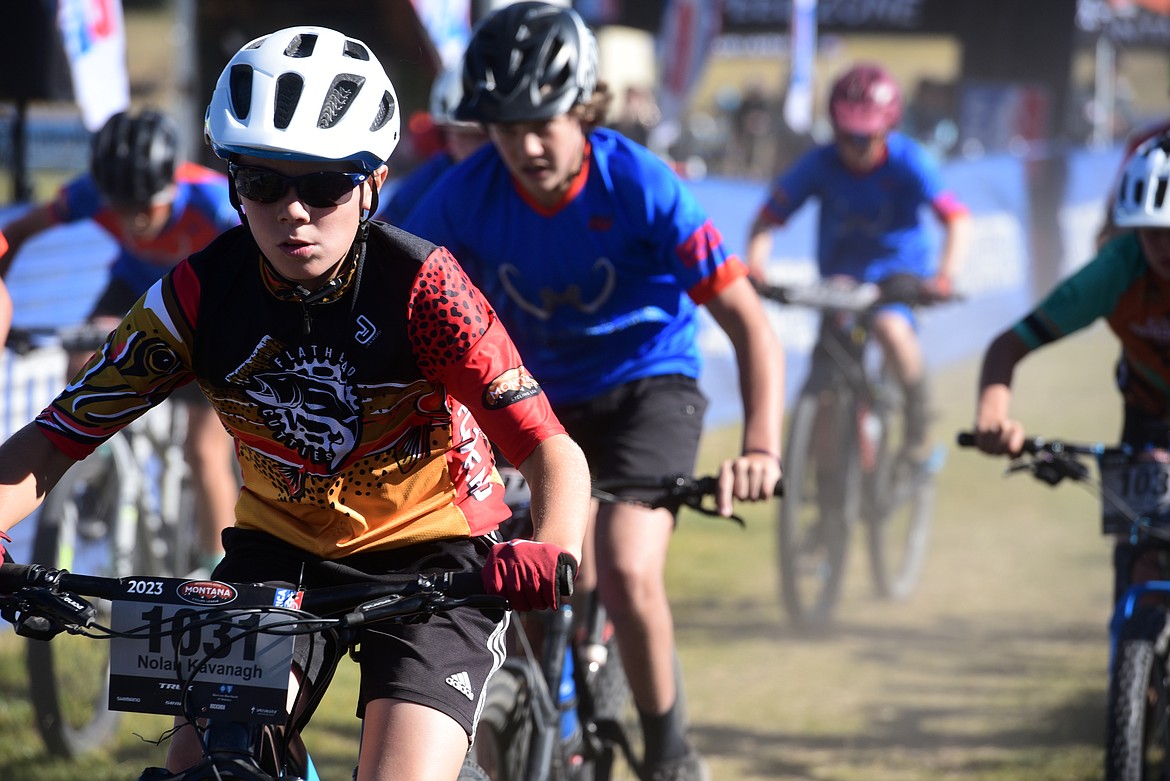 Flathead Cutties rider Nolan Kavanagh sprints from the start line of the Herron Hustle course in Kalispell on Saturday. (Matt Baldwin/Whitefish Pilot)