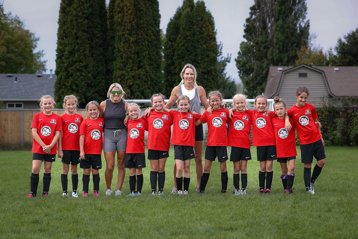 Photo courtesy BUSCEMA PHOTOGRAPHY
The Thorns North FC 14 Girls Red soccer team defeated EW Surf White 5-0 last weekend. The Thorns' goals were scored by Alli Legg, Hatty Lemmon and Audrey Rietze. From left are Blaire Warren, Emma Thompson, Ellie Carper, coach Jean Carper, Avery Doran, Allison Legg, Quinn Baily, coach Kara Lemmon, Audrey Rietze, Hatty Lemmon, Kennedy Tierney, Brooklyn Simoni and Brielle Buscema.