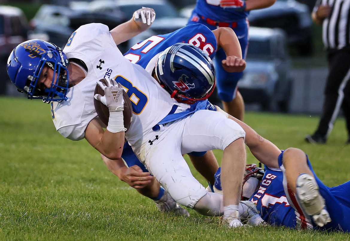 Libby wide receiver Ryan Beagle is brought down after picking up a first down late in the first half at Bigfork Friday, Sept. 15. (Jeremy Weber/Bigfork Eagle)