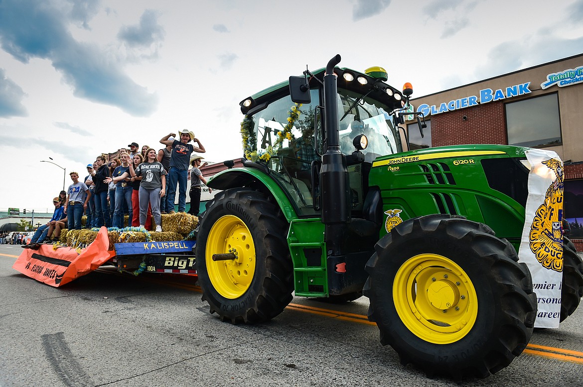 Members of the Kalispell FFA Chapter head down Main Street during the Flathead High School Homecoming Parade in Kalispell on Wednesday, Sept. 20. (Casey Kreider/Daily Inter Lake)