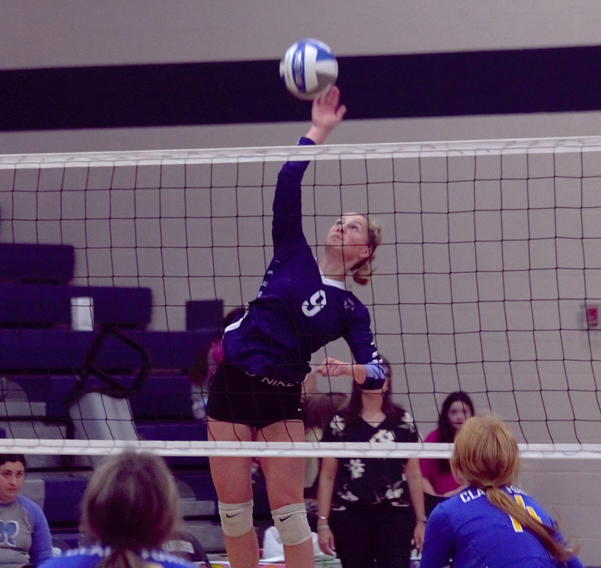 Taren Bateman spikes the ball for the Badgers against Clark Fork on Sept. 14.