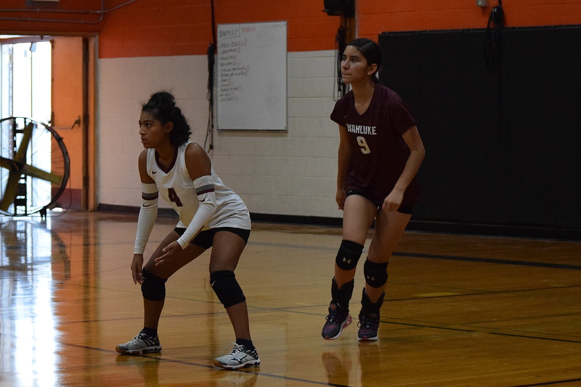 Wahluke senior Jahaza Perez (4) and sophomore Kathy Veloz (9) stand on the back line.