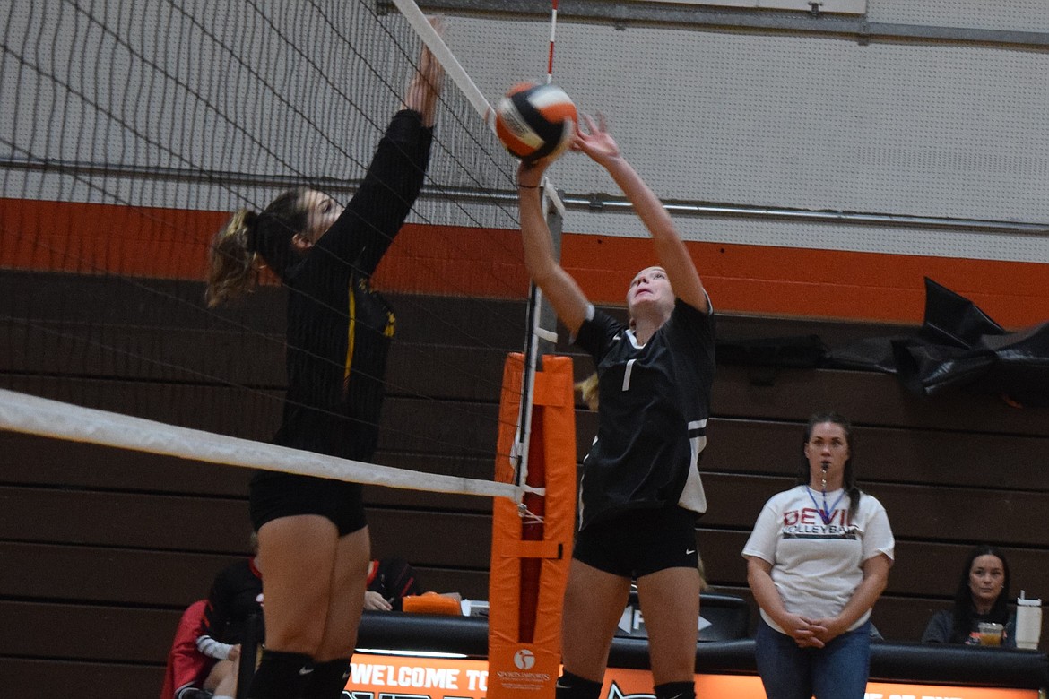 Almira/Coulee-Hartline sophomore Naomi Molitor sets the ball next to the net.