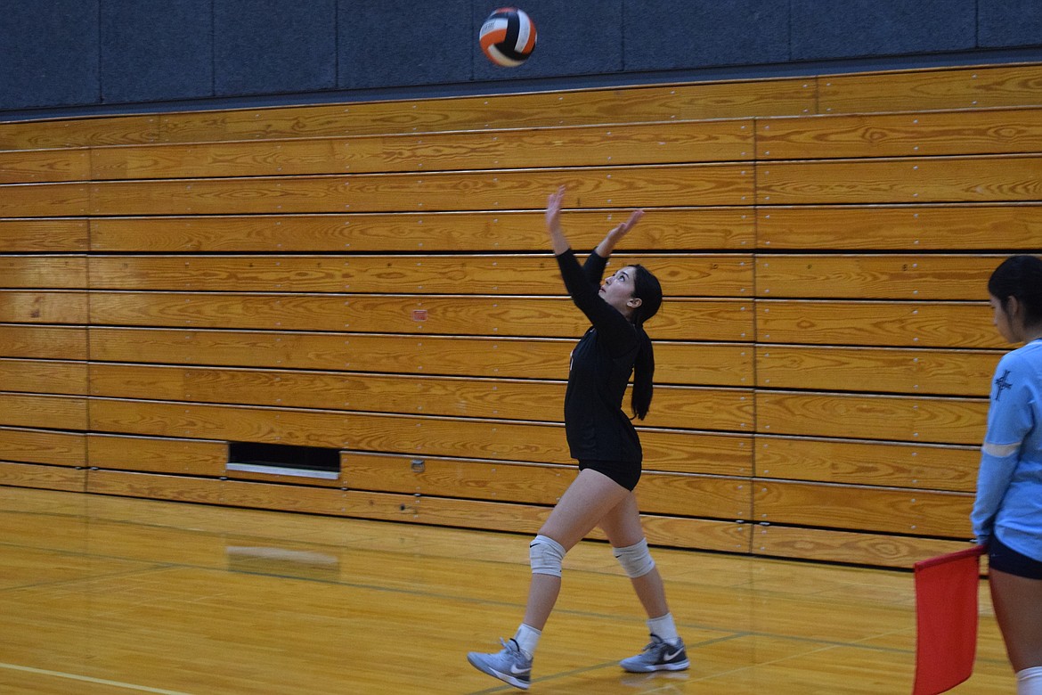 Ephrata senior Natania Vela serves the ball at the Ephrata Varsity Volleyball Tournament on Saturday.