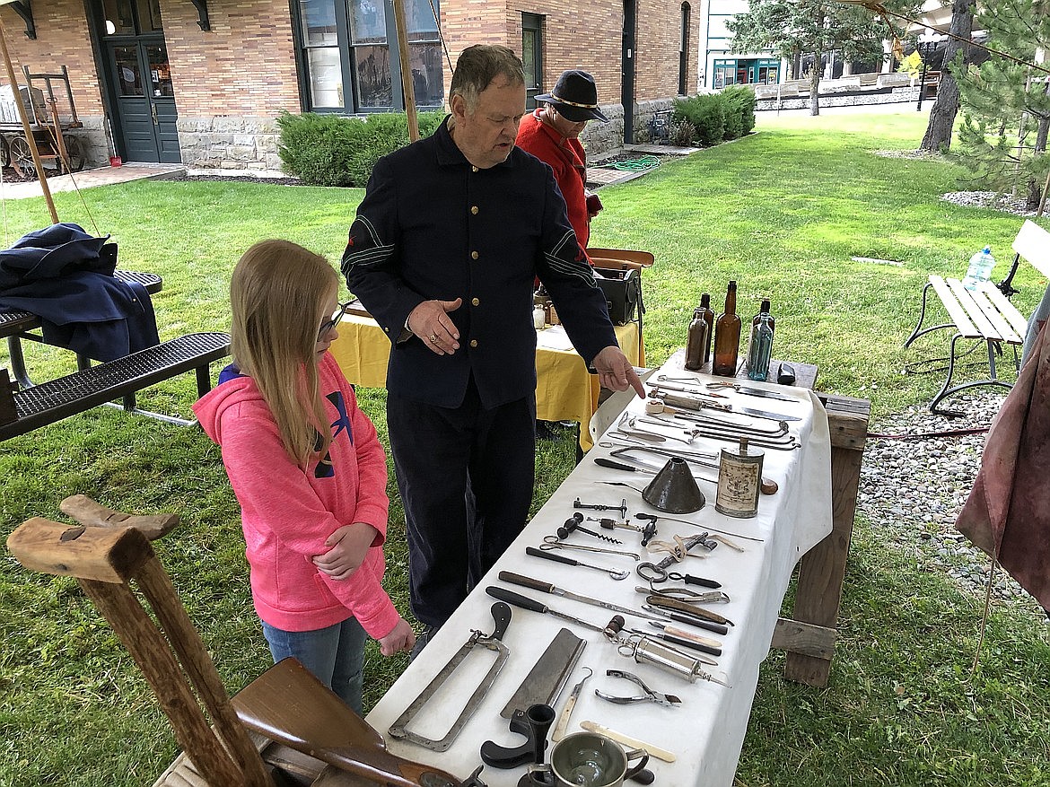 Civil War-era reenactor Mike Inman explains medical practices from the past during Wallace’s Fall for History Festival.