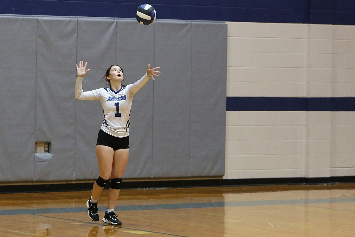 Soap Lake sophomore Mylee Dana serves the ball during the first set.