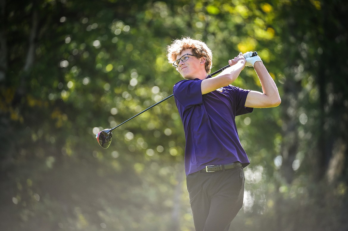 Polson's Carson Hupka watches his drive on the 12th tee during the Western A Divisional tournament at Whitefish Lake Golf Club on Thursday, Sept. 21. (Casey Kreider/Daily Inter Lake)