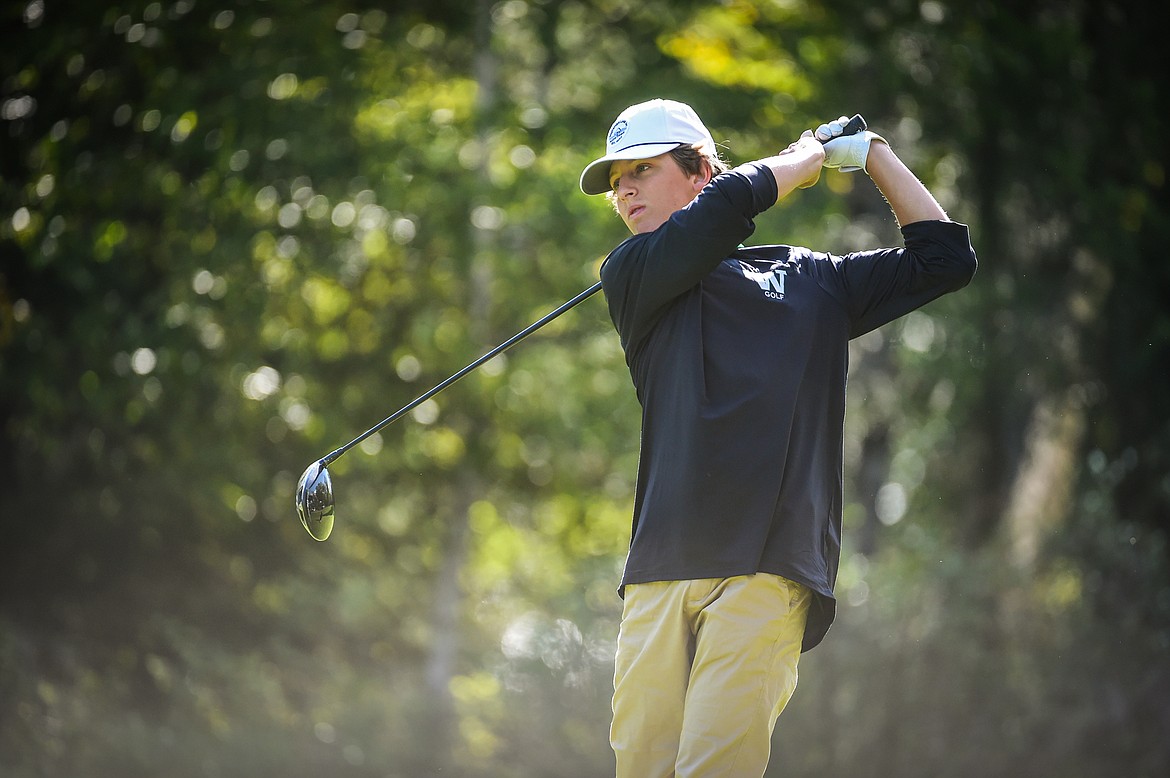 Whitefish's Riley Brown watches his drive on the 12th tee during the Western A Divisional tournament at Whitefish Lake Golf Club on Thursday, Sept. 21. (Casey Kreider/Daily Inter Lake)