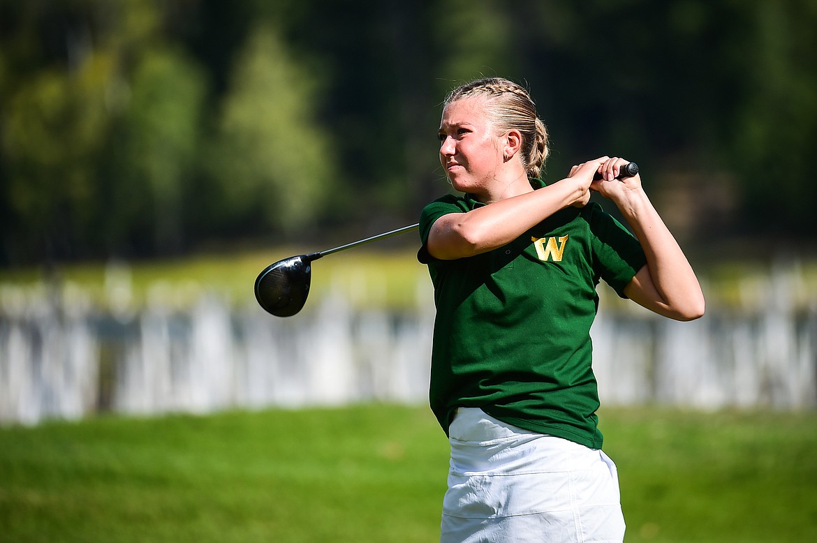 Whitefish's Leia Brennan watches her drive on the 9th tee during the Western A Divisional tournament at Whitefish Lake Golf Club on Thursday, Sept. 21. (Casey Kreider/Daily Inter Lake)