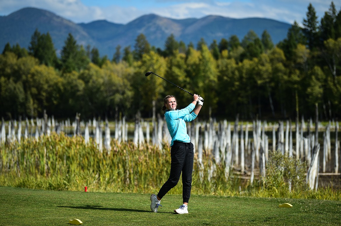 Bigfork's Keni Wade watches her tee shot on the 8th hole during the Western A Divisional tournament at Whitefish Lake Golf Club on Thursday, Sept. 21. (Casey Kreider/Daily Inter Lake)