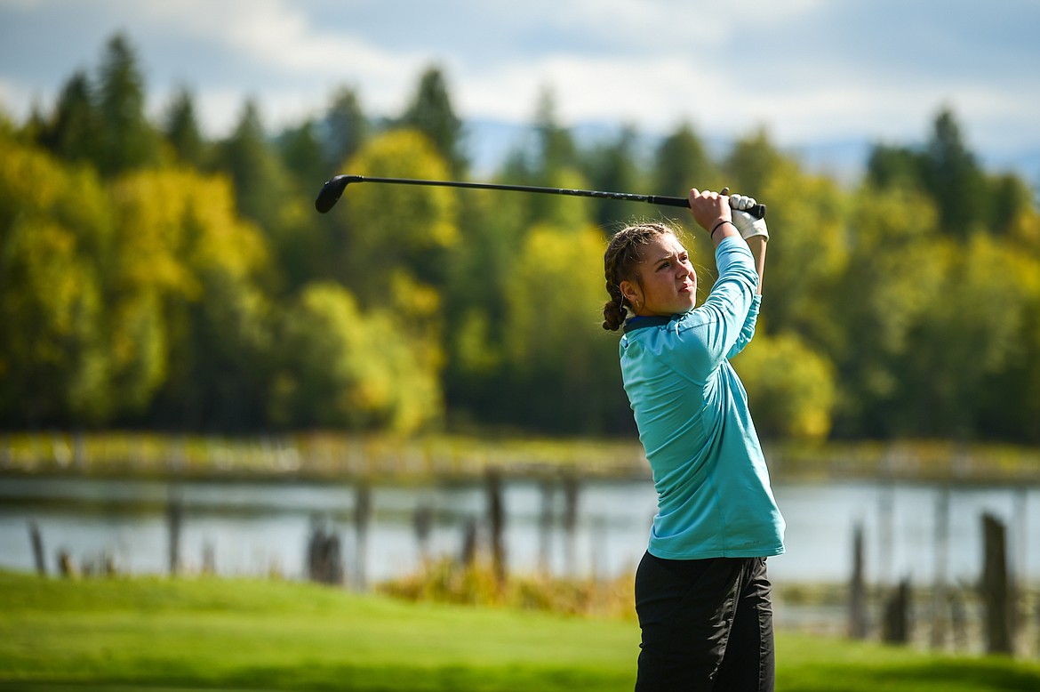 Bigfork's Keni Wade watches her tee shot on the 9th hole during the Western A Divisional tournament at Whitefish Lake Golf Club on Thursday, Sept. 21. (Casey Kreider/Daily Inter Lake)