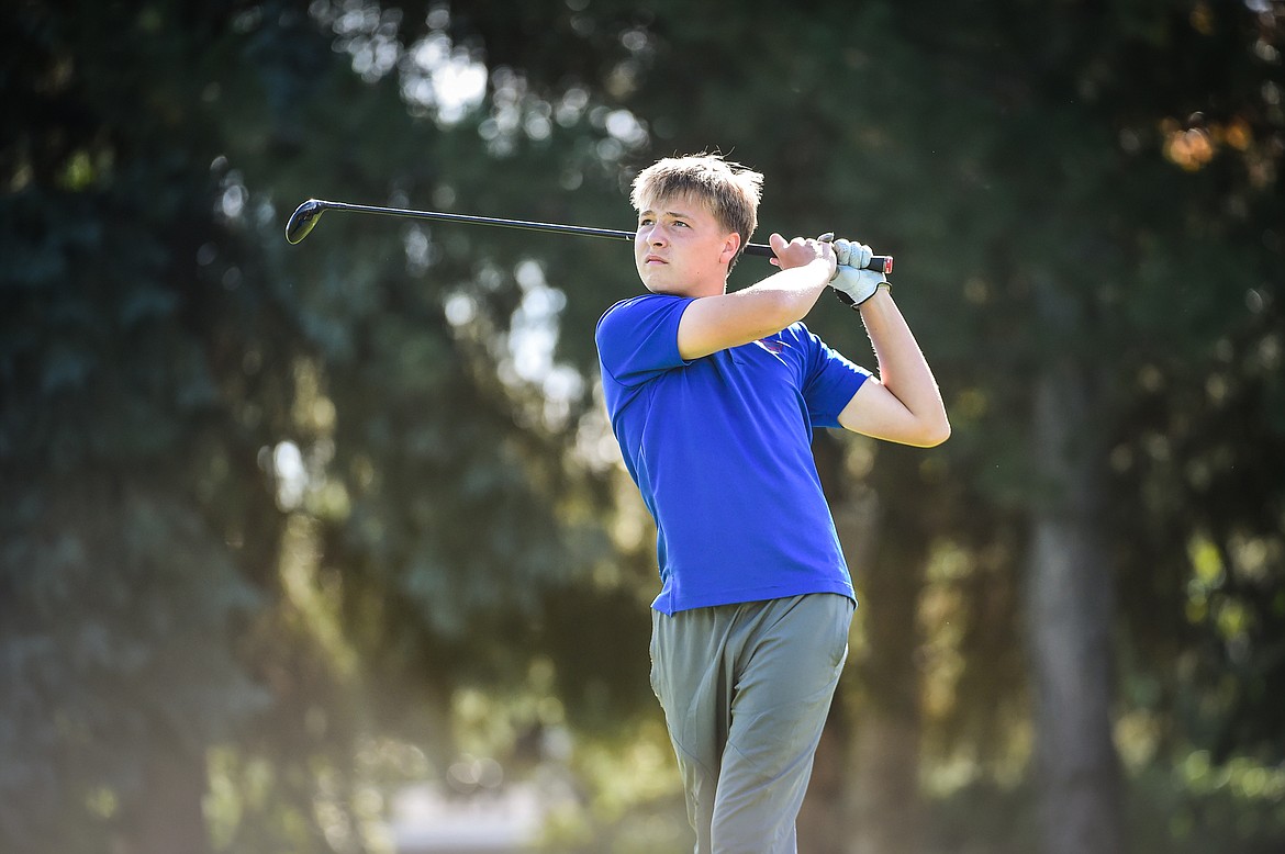 Columbia Falls' Connor Presnell watches his drive on the 17th tee during the Western A Divisional tournament at Whitefish Lake Golf Club on Thursday, Sept. 21. (Casey Kreider/Daily Inter Lake)