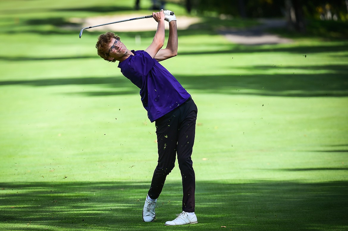 Polson's Carson Hupka watches his approach on the 11th fairway during the Western A Divisional tournament at Whitefish Lake Golf Club on Thursday, Sept. 21. (Casey Kreider/Daily Inter Lake)