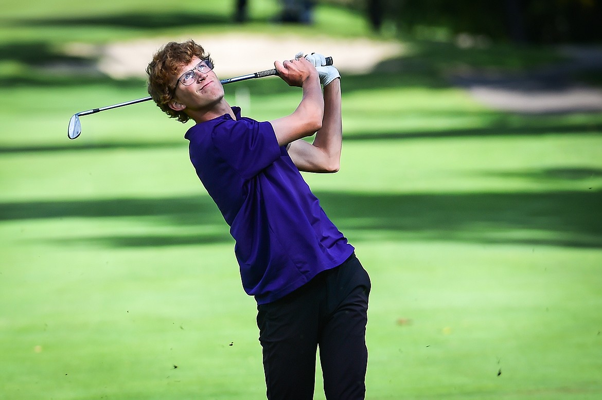 Polson's Carson Hupka watches his approach on the 11th fairway during the Western A Divisional tournament at Whitefish Lake Golf Club on Thursday, Sept. 21. (Casey Kreider/Daily Inter Lake)