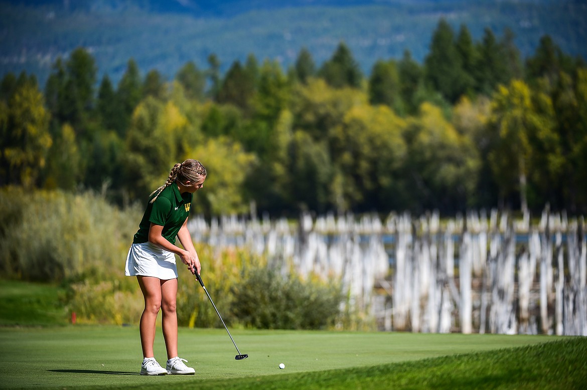 Whitefish's Leia Brennan putts on the 8th green during the Western A Divisional tournament at Whitefish Lake Golf Club on Thursday, Sept. 21. (Casey Kreider/Daily Inter Lake)