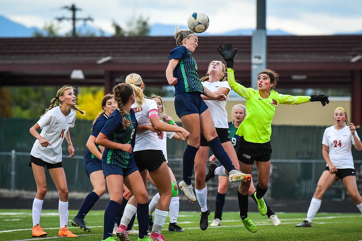 Glacier's Reagan Brisendine (22) goes up for a header off a corner kick against Flathead in the first half at Legends Stadium on Thursday, Sept. 21. (Casey Kreider/Daily Inter Lake)