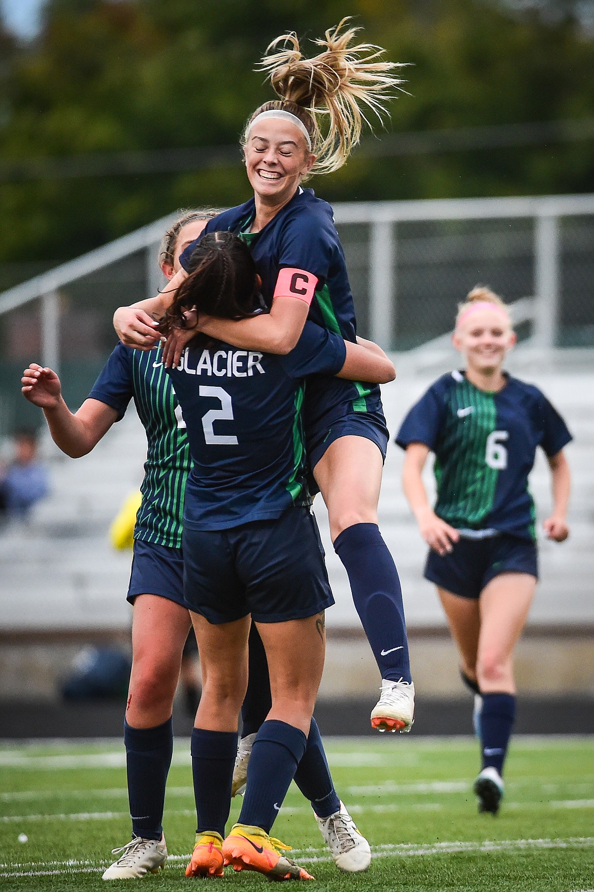 Glacier celebrates after a goal by Reagan Brisendine (22) in the first half against Flathead at Legends Stadium on Thursday, Sept. 21. (Casey Kreider/Daily Inter Lake)